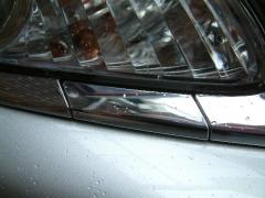 detail of headlight trim showing neat washer insert.JPG