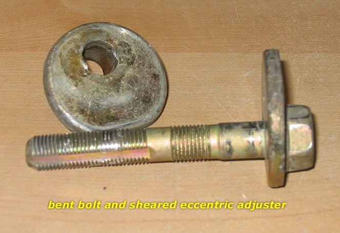 Bent bolt and sheared concentric adjuster